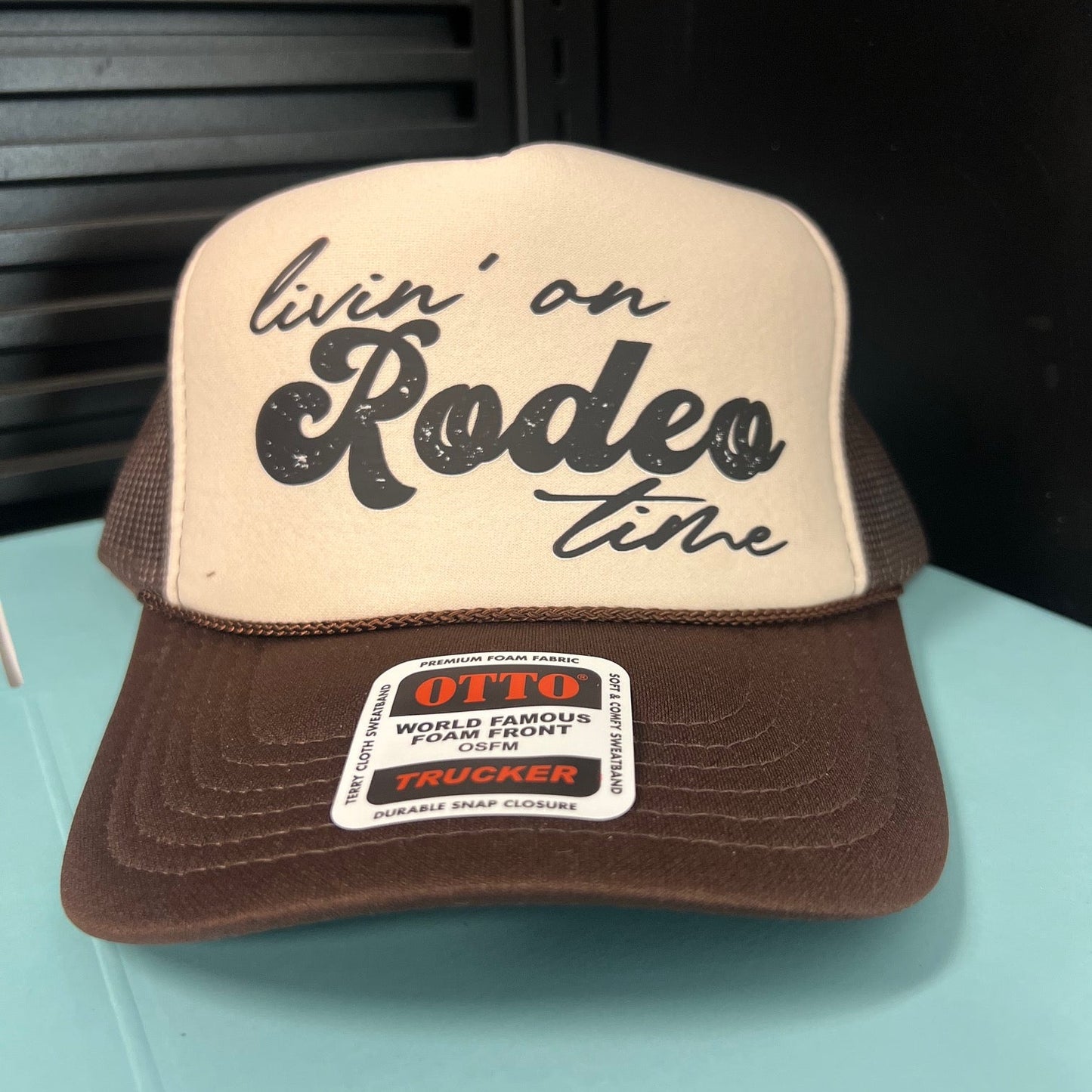 Livin' On Rodeo Time Trucker Hat